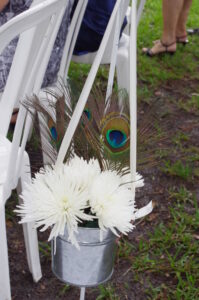 A Happily Ever After Floral, Jacksonville Wedding Flowers, Orchid Bouquet, Peacock Feathers, Winterbourne Inn, Submerged Floral Centerpieces