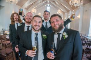 Groomsmen Boutonnieres, Tropical Greenery Altar Floral at The White Room St Augustine, A Happily Ever After Floral, St Augustine Florist