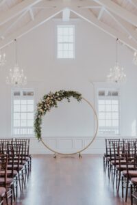 Saying "I Do" at in the Villa Blanca at The White Room St Augustine, Florida, A Happily Ever After Floral, Stephanie W. Photography, Altar Flowers, Moon Gate Arch. Moon Gate Arch Flowers, St Augustine Wedding Flowers, The White Room St Augustine, White Room Weddings, Jacksonville Wedding Florist