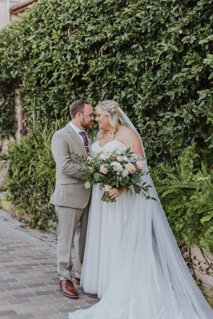 A Happily Ever After Floral, Wedding Flowers at the White Room- St Augustine, St Augustine Wedding Flowers, Round Moon Gate Arch, Altar Wedding Flowers, Stephanie W. Photography